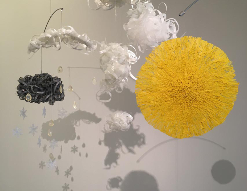 a photograph of a hanging sculpture in plastic